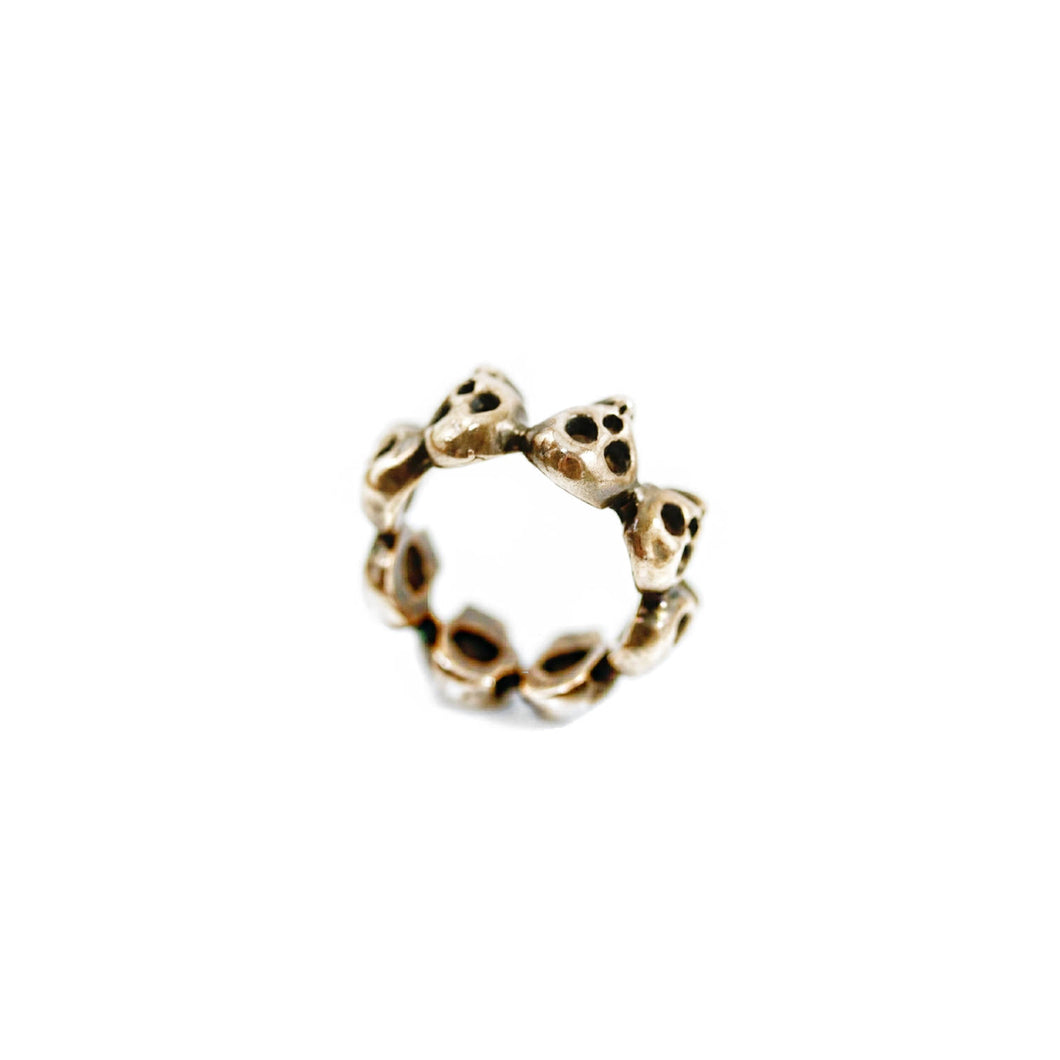 Rose Brass 8-Skull Band Ring